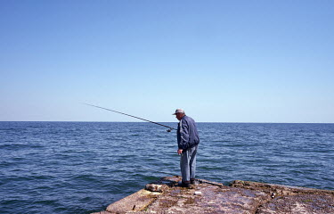 Victor (67) fishing in Black Sea despite Russia's war.