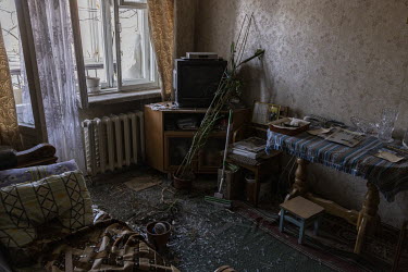 The destroyed interior of Halyna Pepelova's apartment after a Russian multiple rocket attack in the Nyvky district of western Kyiv early that morning.