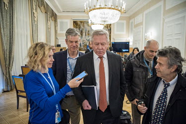 Russian ambassador Gennady Gatilov leaving a press conference at the Russian Mission, following the vote of censure by the UN Human Rights Commission, the week following the invasion. The conference w...