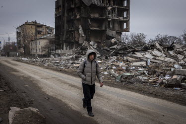 A man walks through the battle scarred centre of the small town of Borodianka where, according to the acting mayor, as many as 200 people are missing, presumed dead, still lying under the rubble left...