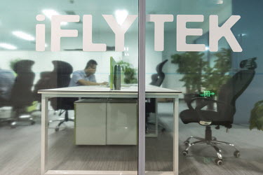Employees work inside Iflytek Co.'s regional headquarters in Guangzhou, China, on Tuesday, Oct. 31, 2017. Iflytek, which specializes in voice recognition, has been blacklisted by the U.S. government o...