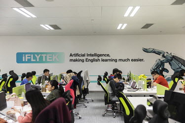 Employees work inside Iflytek Co.'s regional headquarters. Iflytek, which specialises in voice recognition, has been blacklisted by the U.S. government on the 'Entity List' for human rights violations...