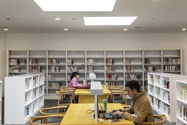 Students studies in a library wing on the campus of the Shanghai Tech University.