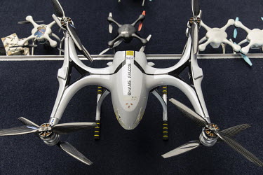 Drones sit on the floor in a testing facility at the EHang Inc. headquarters. The Chinese startup has developed a flying car that it plans to roll out as soon as 2018. The E-184 drone can carry one pa...