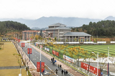 Students walk through the campus at Kweichow Moutai Co.'s Moutai University in Renhuai.