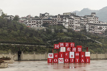 A welcome sign stands in a square in the town of Maotai in Renhuai.