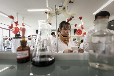 Students attend a chemistry class at Kweichow Moutai Co.'s Moutai University in Renhuai.