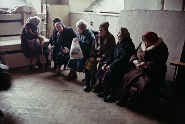 A group of elderly women socialising.