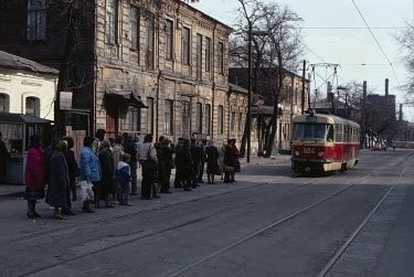 A queue waiting for a tram.