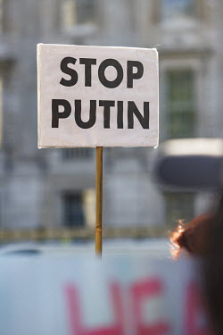 A sign that reads 'Stop Putin' at a protest in Whitehall against the Russian invasion of Ukraine.