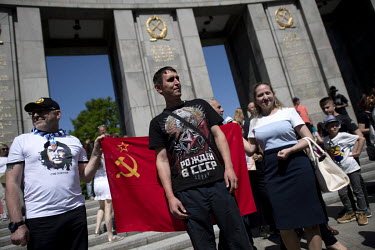 Russians with a Soviet flag at the Tiergarten on 8 May 2022, the 77th anniversary of the 1945 victory against Nazi Germany and the end of World War Two. Due to Russia's invasion of Ukraine the ceremon...