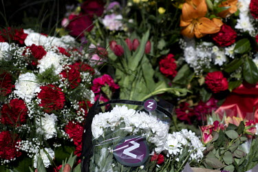 A bouquet of flowers with a 'Z' logo (from Dutch flower company Zentoo) lies among the blooms at the Tiergarten on 8 May 2022, the 77th anniversary of the 1945 victory against Nazi Germany and the end...