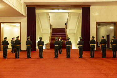 A military band practices in a hall before a voting session at the first session of the 13th National People's Congress (NPC) at the Great Hall of the People.