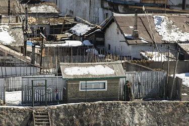 A soldier in the town of Hyesan, North Korea, seen from across the border in Changbai.