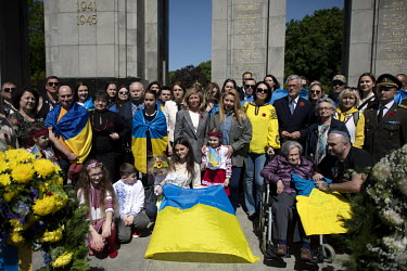 Andriy Melnyk, the Ukrainian Ambassador to Germany, with a group of Ukrainians at the Soviet war memorial in the Tiergarten on 8 May 2022, the 77th anniversary of the 1945 victory against Nazi Germany...