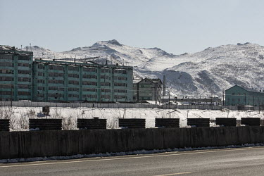A view of the town of Hyesan, North Korea, seen from across the border, formed by the frozen Yalu River, in Changbai.