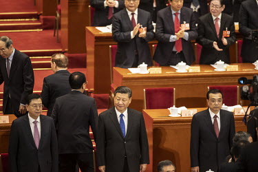 Chinese President Xi Jinping and other top leaders stand in the Great Hall of the People ahead of the opening of the first session of the 13th Chinese People's Political Consultative Conference (CPPCC...