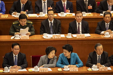 Top leaders of the Chinese government sit in the Great Hall of the People ahead of the opening of the first session of the 13th Chinese People's Political Consultative Conference (CPPCC).