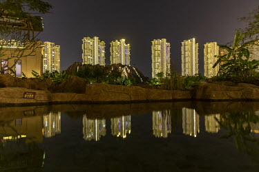 Residential buildings seen from the Yalong Bay Mangrove Tree Resort, operated by Antaeus Group.