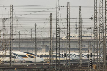 China Railway High-speed (CRH) trains, operated by China Railway Corp., sit in a train yard on the outskirts of Shanghai.