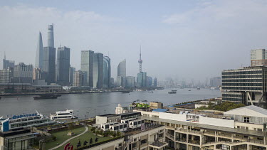 The Oriental Pearl Tower (centre), stands among other buildings in the Lujiazui Financial District on the Pudong riverside.