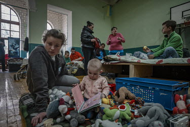 Vera I fled with her husband, Evan, and three children, Eva, Sergey and Vlad. They came from Molochansk near Zaporiizhzhia. "We left in an organised convoy. There were burning tanks and bodies on the...