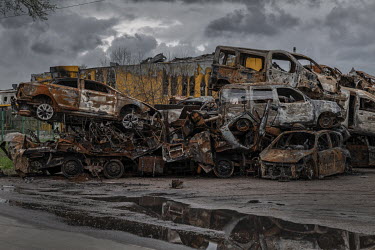 A pile of vehicles destroyed during fighting.