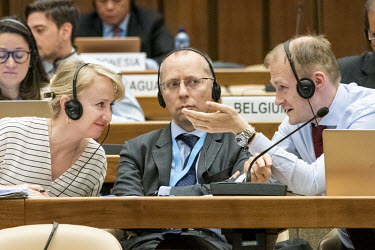 Russian diplomats including Boris Bondarev (right with glasses), Russia's counsellor to the United Nations in Geneva, photographed at open-ended Working Group on Reducing Space Threats on 11th May 202...