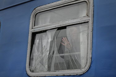 Valeriy says goodbye to his girlfriend who is leaving Ukraine and heading for Poland on a train that had earlier been damaged by Russian cruise missiles near Zaprorizhzhia.