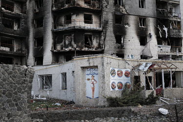 The remnants of a cafe at the base of a destroyed apartment block. Large areas of Bodoryanka were destroyed during intense and sustained bombardments.