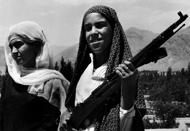 Armed female militia members, organised by the Soviet occupation forces to protect their community from attacks by the US supported Mujaheddin.