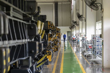 Employees operate in the SAIC-GM-Wuling Automobile Co. Baojun Base plant, a joint venture between SAIC Motor Corp., General Motors Co. and Liuzhou Wuling Automobile Industry Co., in Liuzhou, Guangxi p...