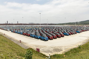 Wuling E1oo mini EV models sit in a parking lot at the SAIC-GM-Wuling Automobile Co. Baojun Base plant, a joint venture between SAIC Motor Corp., General Motors Co. and Liuzhou Wuling Automobile Indus...
