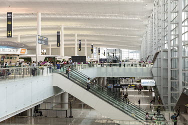 Passengers move through the newly opened Terminal 2 of the Guangzhou Baiyun International Airport.