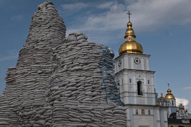 The Princess Olha (Olga) Monument in front of St Michael's Cathedral in central Kyiv has been covered up with sandbags in anticipation of Russian airstrikes.
