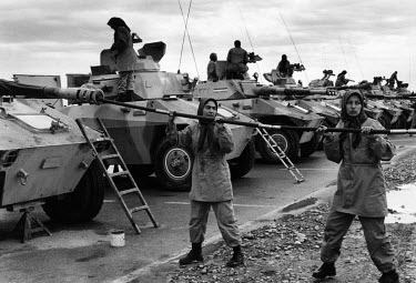 Dissident Iranians train with armoured vehicles near the Iraq/Iran border.