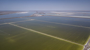 An evaporation pond operated by Qinghai Salt Lake Industry Co. in the Chaerhan Salt Lake. Qinghai Salt Lake produces potash fertilizers, potassium chloride and lithium carbonate, with lithium becoming...