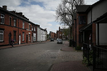 A woman walks along Spring Street in the East Ward area in the town centre.  Local elections are due in the political constituency of Bury North on 27 April 2022, a traditionally Labour Party seat tha...