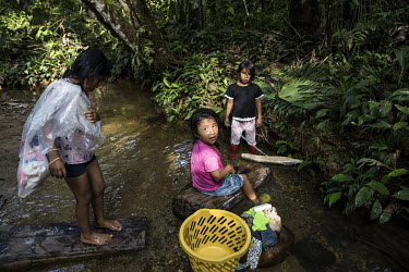 All members of the family have their own task, children included. Maya and her sisters come every day to hand-wash the clothes in the river.