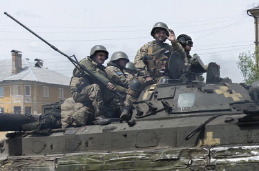 Ukrainian Soldiers on armoured transport move along the Donbas Front near the town of Bakhmut toward Sievierodonetsk.