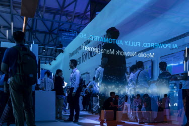 Visitors attend the Mobile World Congress.