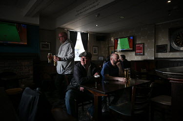 Martin Watmough (left) is pictured drinking with a friend in the Royal Oak pub, in Radcliffe, one of the more deprived areas in the political constituency of Bury North.  Local elections are due in th...