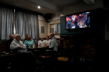 Campaigners and candidates for the Radcliffe First political party relaxing in the Royal Oak pub after a long day of canvassing for votes in Radcliffe, one of the more deprived areas in the political...