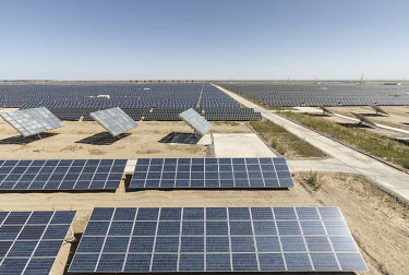 Photovoltaic panels at the Golmud Solar Park on the outskirts of the city. China leads the world in solar energy production with most its solar power generated in its western provinces and transferred...