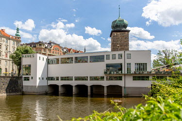 The Manes Gallery straddling a branch of the Vltava River. Toyen (Marie Cerminova) joined the Manes art association and took part in the great Poetry 32 exhibition, which brought her into contact with...