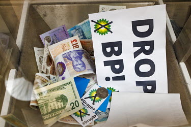 'Drop BP!' signs in a donation bin at the British Museum where climate activist group 'BP or not BP' staged a 'Drop BP' event, calling for an end to BP sponsorship.