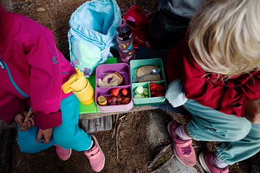 Pupils at Fortet Barnehage, a forest kindergarten founded by Dag Fredriksen, eat a packed lunch in the woods