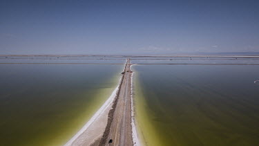 An evaporation pond operated by Qinghai Salt Lake Industry Co. in the Chaerhan Salt Lake. Qinghai Salt Lake produces potash fertilizers, potassium chloride and lithium carbonate, with lithium becoming...