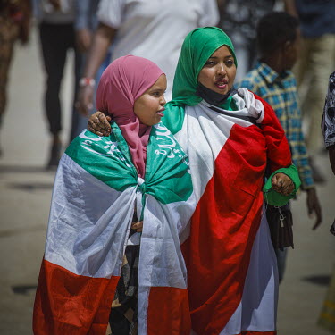 Two women wrapped in the national flag of Somaliland, as the country celebrates its 31st anniversary of independence from Somalia.