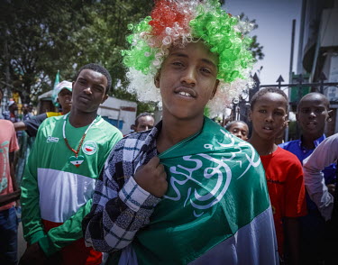 A young man wearing a wig in the colours of the national flag of Somaliland, as the country celebrates its 31st anniversary of independence from Somalia.